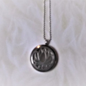 Jewelry- Silver round Lotus Flower locket with ball chain